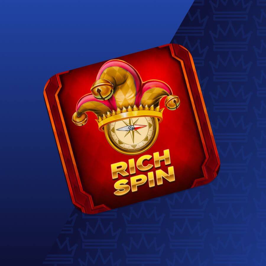Red game tile with a gold compass and crown, showing the words Rich Spin against a blue gradient of background.